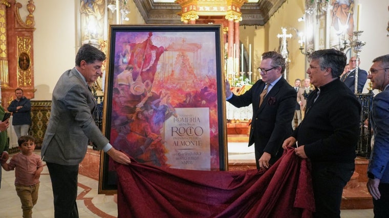 Momento en el que se descubre el cartel de la Romería del Rocío 2025